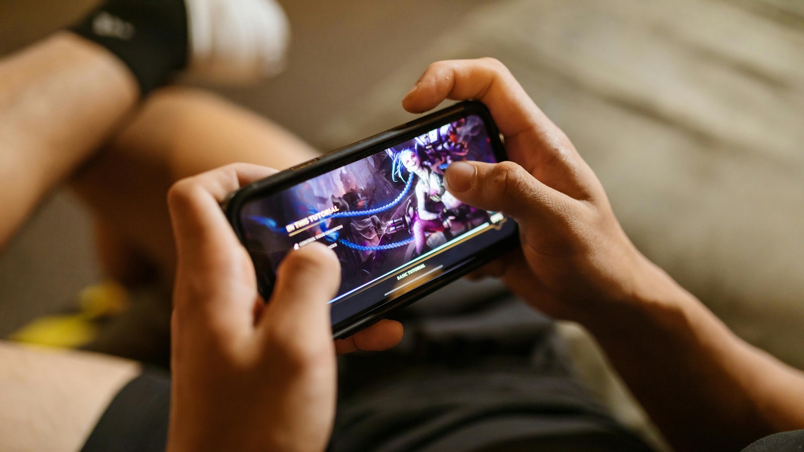 Guy Playing Game On Phone